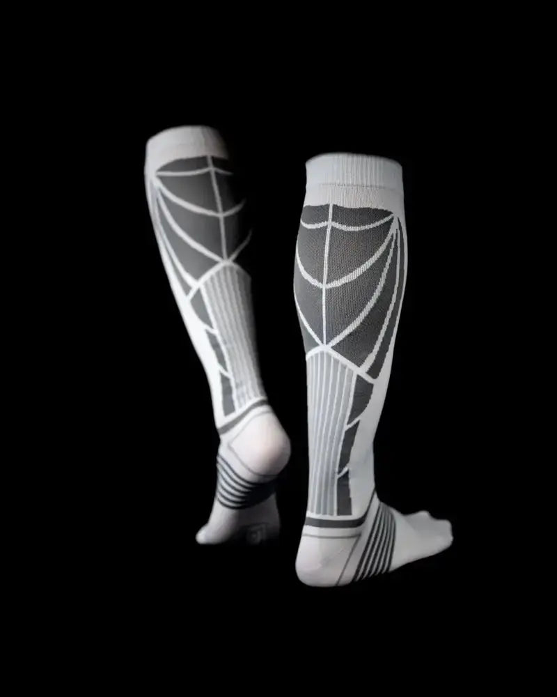 Chaussettes de compression pour améliorer la circulation sanguine et favoriser une récupération rapide après l’effort.