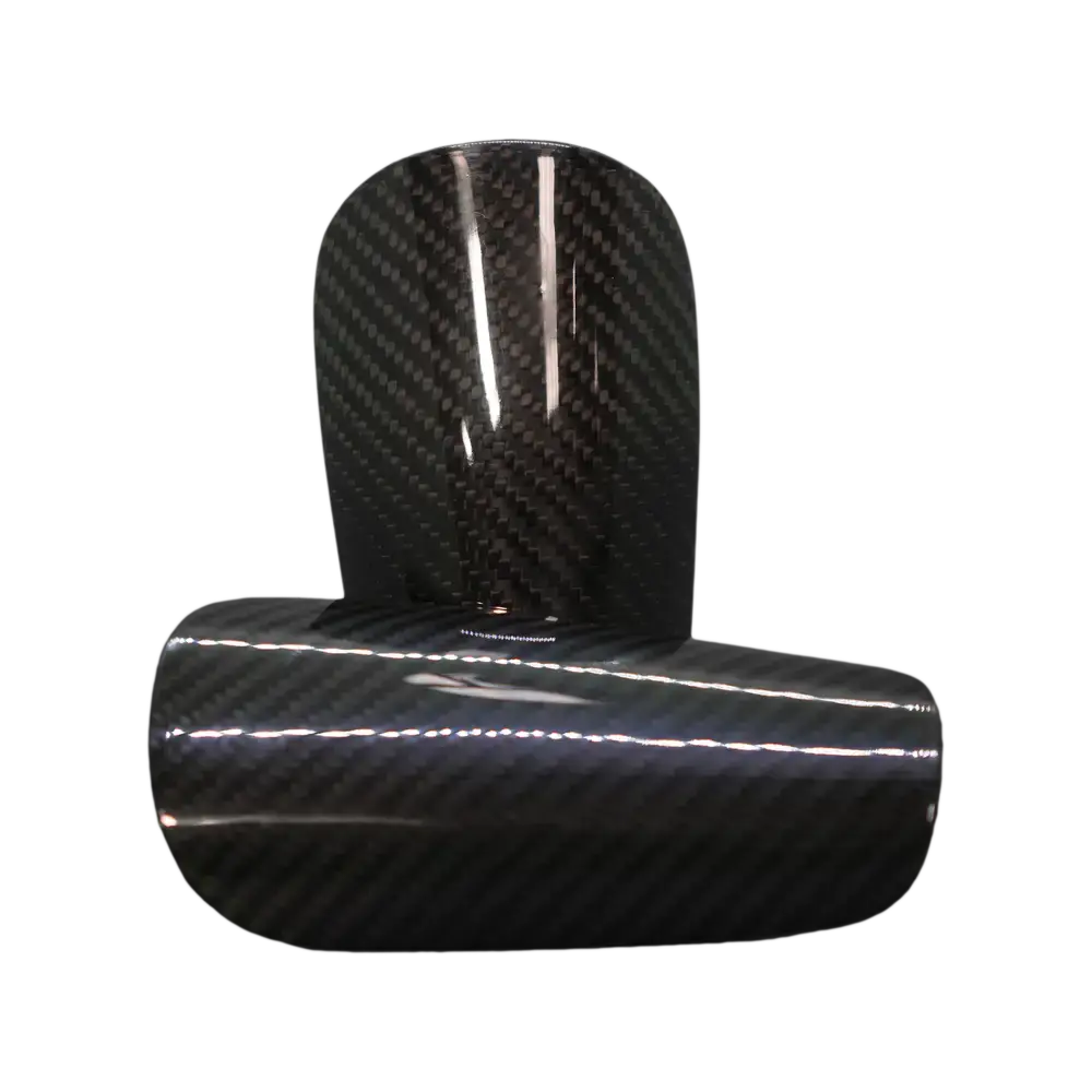Protèges-tibias Carbone, offrant une protection robuste et légère grâce à leur conception en carbone.